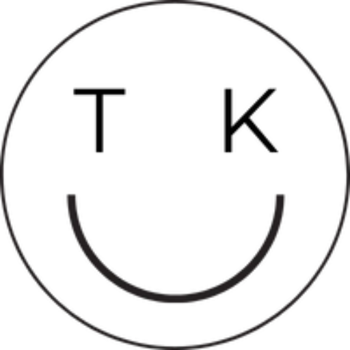 A black and white line drawing of a smiley face with squinting eyes and a wide grin.